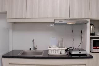 Comfortable and Spacious Studio at Azalea Suites Apartment By Travelio - 1