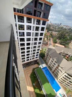 serenity heights apartment with heated swimming pool fully equipped gym ample parking space child play area and a relaxing rooftop with amazing scenic views - Nairobi - 1