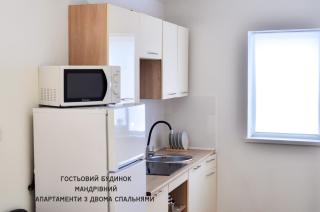 Guest House Mandrivnyi Rooms&Apartments - Yasinia - 7
