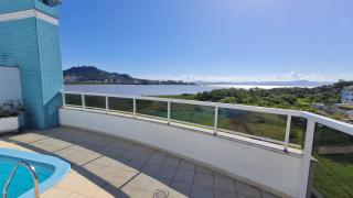 Uma Suíte em Cobertura frente ao Mar - 1