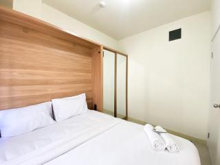 Comfort and Strategic 2BR at Green Pramuka City Apartment By Travelio - 2