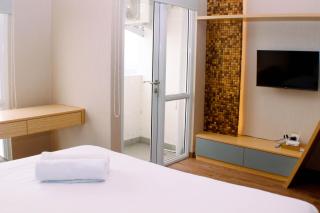 Restful and Modern Studio at Vasanta Innopark Apartment By Travelio - Bekasi - 4