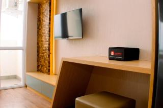 Restful and Modern Studio at Vasanta Innopark Apartment By Travelio - Bekasi - 1
