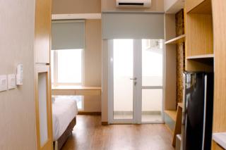 Restful and Modern Studio at Vasanta Innopark Apartment By Travelio - Bekasi - 5