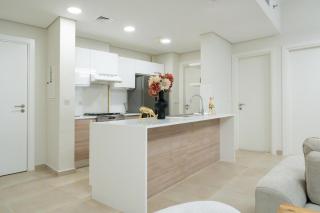 Veluxa - Renovated 1BHK next to Golf - 9