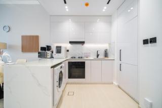 SettlerHomes - Chic JVC Cityview Near Heart of Dubai - 1