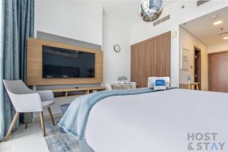 Elegant Studio Without Balcony- Damac Hills, Dubai - Host & Stay - 9