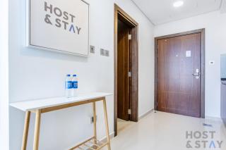 Elegant Studio Without Balcony- Damac Hills, Dubai - Host & Stay - 5
