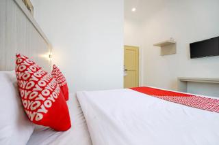 OYO Life 1299 Balcony Orange Homestay - Palembang - 9