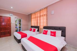 Super OYO 89348 Rg Motel - Changlun - 6