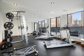 Stylish Condo with Exclusive Rooftop Pool - 6