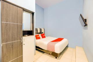 OYO 90009 Faster Inn 1 - Medan - 5
