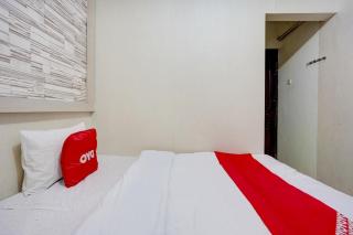OYO Life 90606 Glass House Citraland Syariah - Surabaya - 8