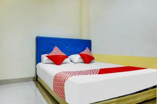 OYO 91182 Kos'ta Homestay Makassar - Makassar - 1
