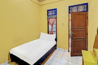 OYO 91235 Pondok Damu - Kapal - 9