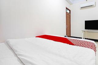 OYO 91322 Jawara Guest House Syariah - Bandung - 3