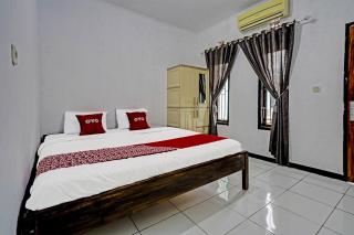 OYO 91334 Permata Papua Guest House - 6