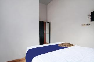 SPOT ON 91598 Oklahoma Homestay Syariah - 6