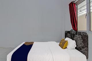 SPOT ON 91699 Homestay Hj Lela Syariah - Pekanbaru - 7