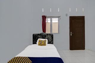 SPOT ON 91699 Homestay Hj Lela Syariah - Pekanbaru - 6