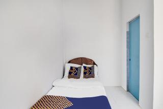 SPOT ON 91858 Raja Homestay Syariah - Pekanbaru - 2
