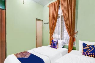 SPOT ON 91875 Nayla Homestay Syariah Near Koro Koro Panam, Karaoke, Pool, & Cafe - Pekanbaru - 5