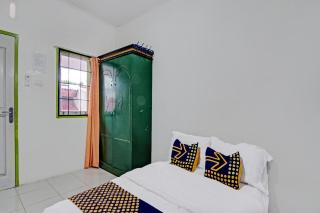 SPOT ON 91950 Guest House TekNong Syariah - Bangkinang - 9