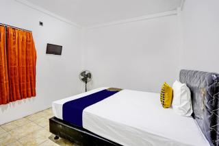 SPOT ON 92452 Griya Sandi Residence Family NearPantai Boom - Banyuwangi - 9