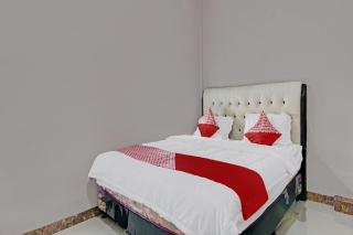 OYO 92456 Putri Homestay Syariah Near SPBU 14.282.694 (Air Hitam) - Pekanbaru - 2