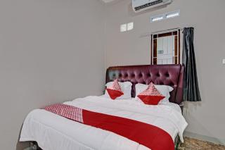OYO 92456 Putri Homestay Syariah Near SPBU 14.282.694 (Air Hitam) - Pekanbaru - 4