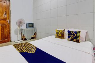 SPOT ON 92535 Guest House Pak Darso - 4