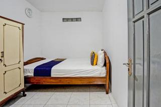 SPOT ON 92595 Umi Homestay Syariah - 2