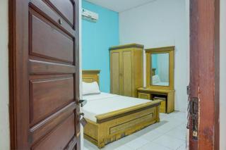 Hotel O Ervina Homestay Syariah Batakan - 2