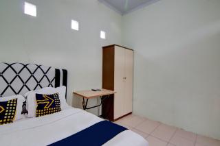 SPOT ON 92797 Awi Stay Syariah Near SIMPANG KAWASAN INDUSTRI WILMAR PELINTUNG - Dumai - 8