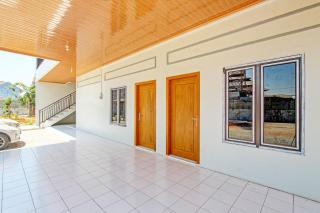 OYO 93050 Mi Casa Inn - Pati - 6