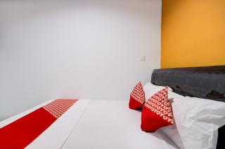 Super OYO Capital O 93076 Batam Backpacker Guesthouse 2 - Pembunuh - 1