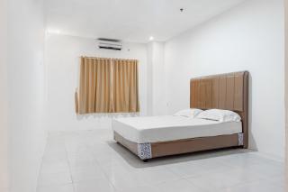 OYO 93388 Enjoy Homestay & Cafe - Sungguminasa - 5