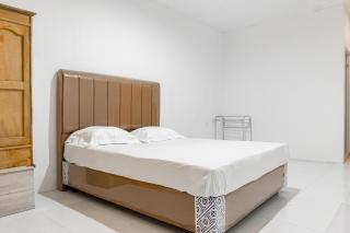 OYO 93388 Enjoy Homestay & Cafe - Sungguminasa - 4