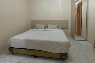 OYO 93502 Homestay Pakmuklis Syariah 2 Near Taman Mini Lhokseumawe - Lhokseumawe - 8