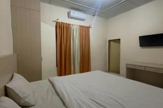OYO 93502 Homestay Pakmuklis Syariah 2 Near Taman Mini Lhokseumawe - Lhokseumawe - 3