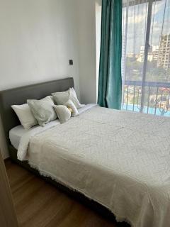 luxury elegant furnished three bedroom apartment with children playing ground,swimming pool relaxing rooftop with amazing city views, ample parking space and proximity to major shopping malls - 8