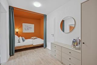 MAISUITES Sperling - Zentrale Ferienwohnung mit Boxspringbett, Kaffeevollautomat, WLAN & seitlichem Seeblick - Mölln - 6