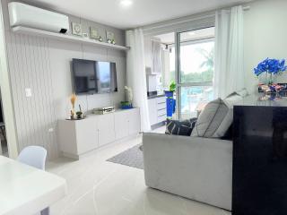 Passos da praia c/ piscina apto iluminado e novo - 3