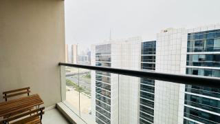 Upscale Studio Apartment Business Bay with Balcony and Free Parking by BelVilla - Dubai - 2