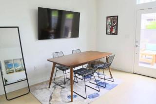 Upscale 2BR Condo w Patio City Views Walk to DT - 6