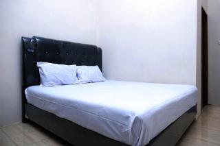 OYO Life 2507 Rooftop Homestay - Pekanbaru - 9