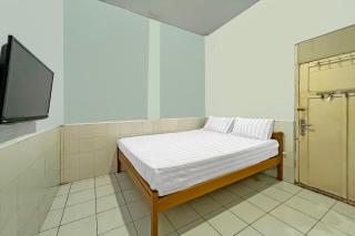 SPOT ON 92654 Oma Homestay - Makassar - 8
