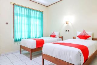 Super OYO 1654 Maha Bharata Kuta Inn - Legian - 9