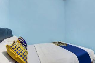 SPOT ON 90744 Alika Homestay - Demak - 6