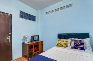 SPOT ON 90744 Alika Homestay - Demak - 8